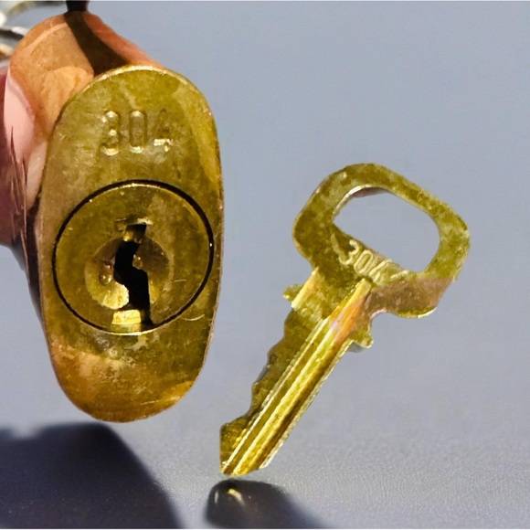 Louis Vuitton GOLD Lock & Key Gold tone Authentic. Number 304 MSRP $300 - Picture 3 of 7